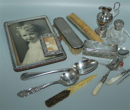 Silver pin dish, 2 silver-mounted photo frames, similar toilet bottle, trinket box and brush, sundry plated items & Zippo lighter